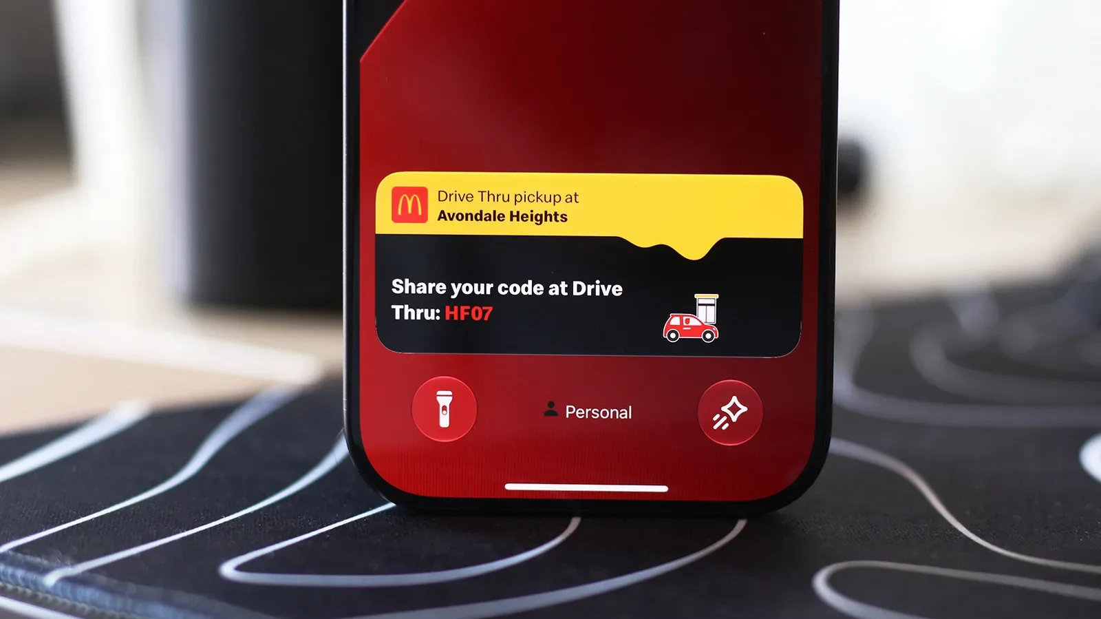 iPhone Dynamic Island showing a Live Activity