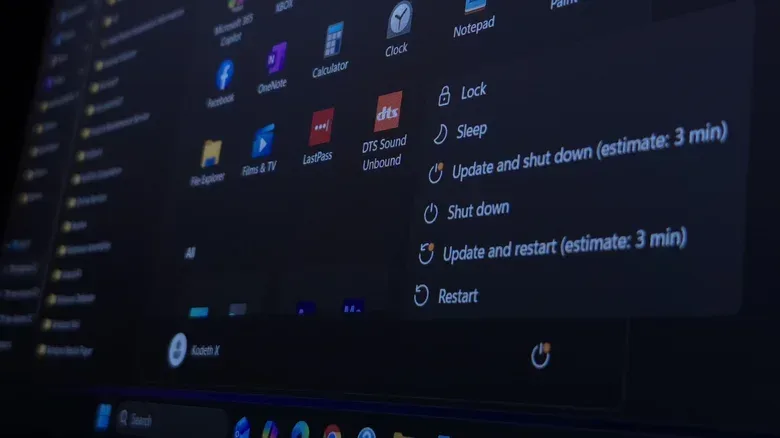 Windows 11 shutdown and restart options in the Start Menu, prompting to install an update.
