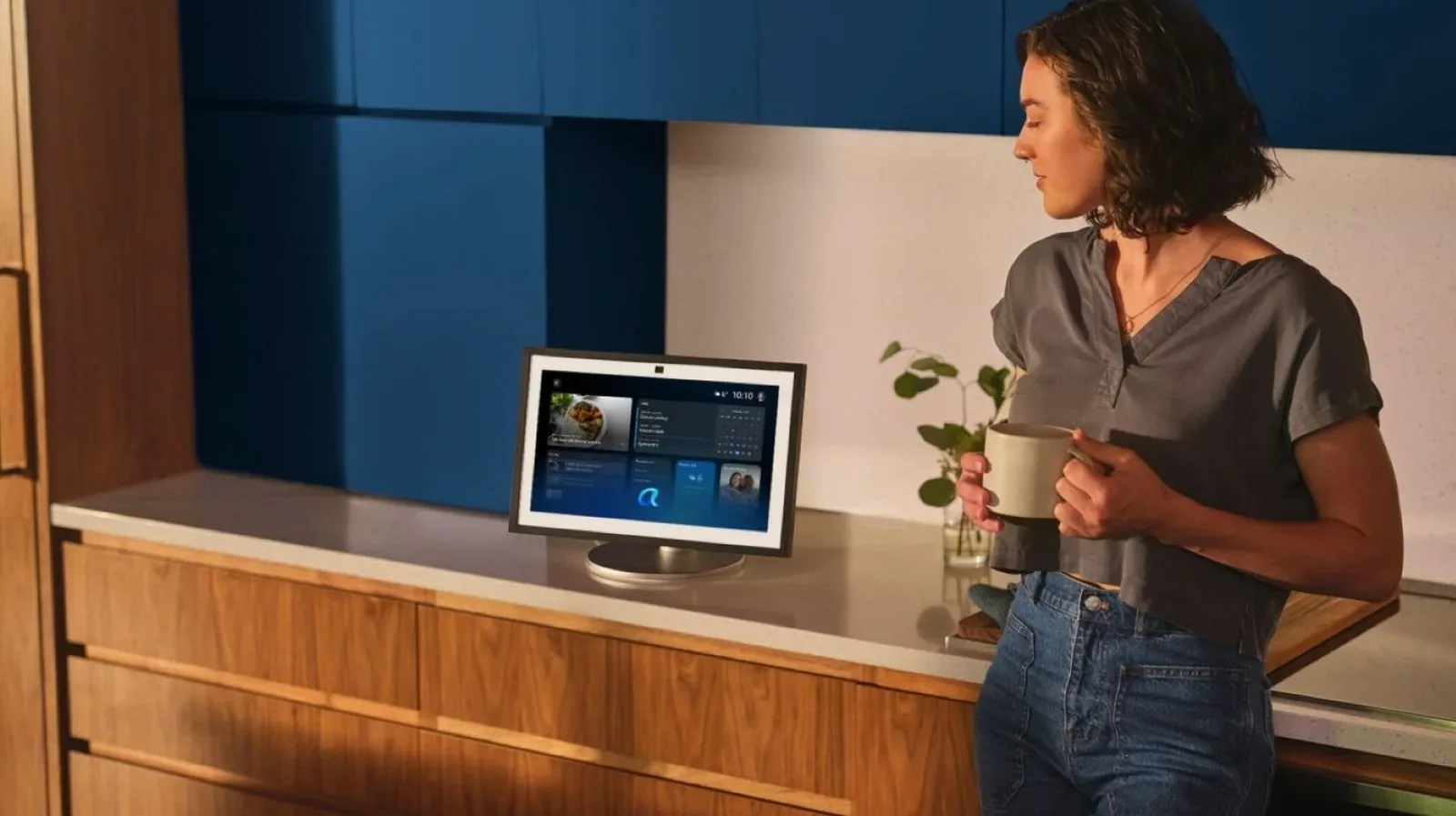 An Amazon Echo smart speaker displaying Alexa+ access for Prime members