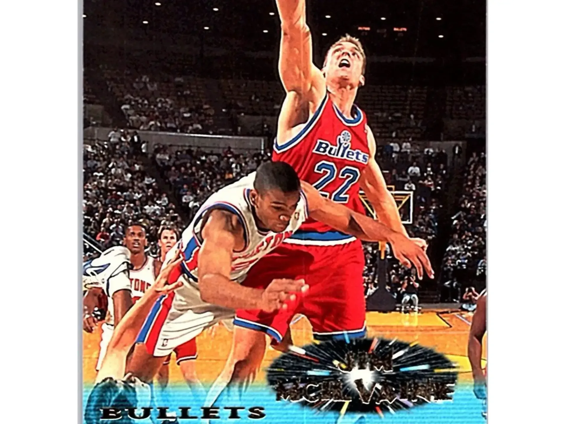 An uncut basketball trading-card sheet displayed in a frame