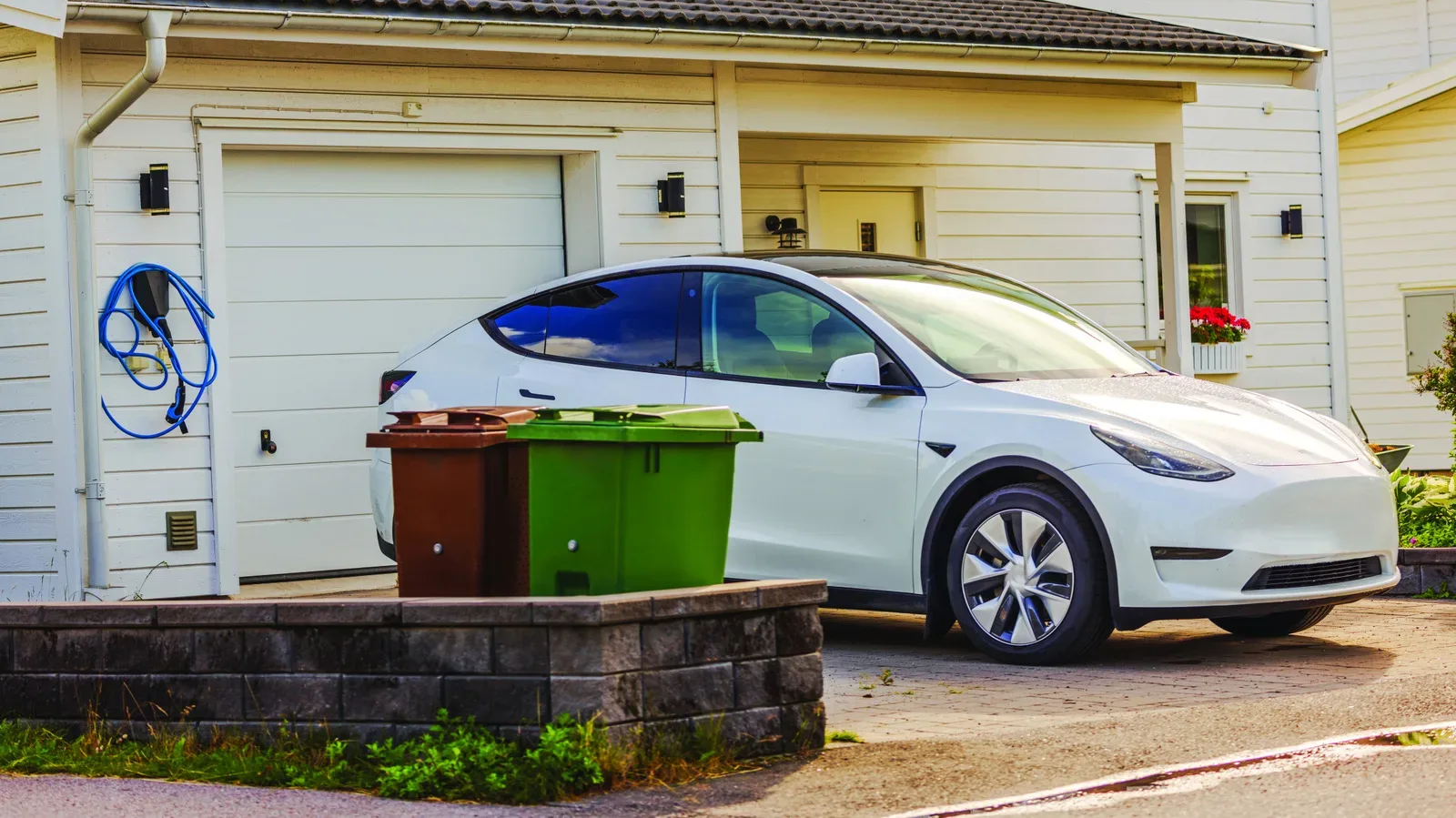 Electric vehicle parked with battery charge indicator visible