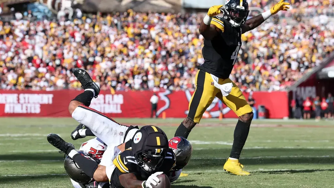 Pittsburgh Steelers rookie receiver Germie Bernard scores a touchdown in overtime against the Tampa Bay Buccaneers.