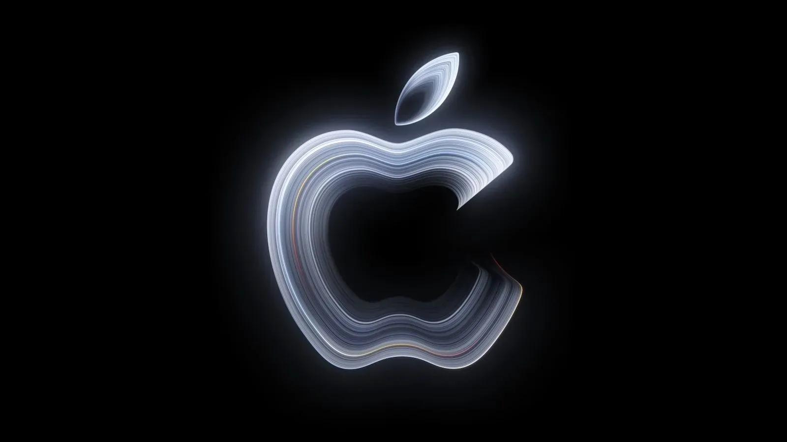 Concept-style view of an OLED MacBook Pro with touch controls