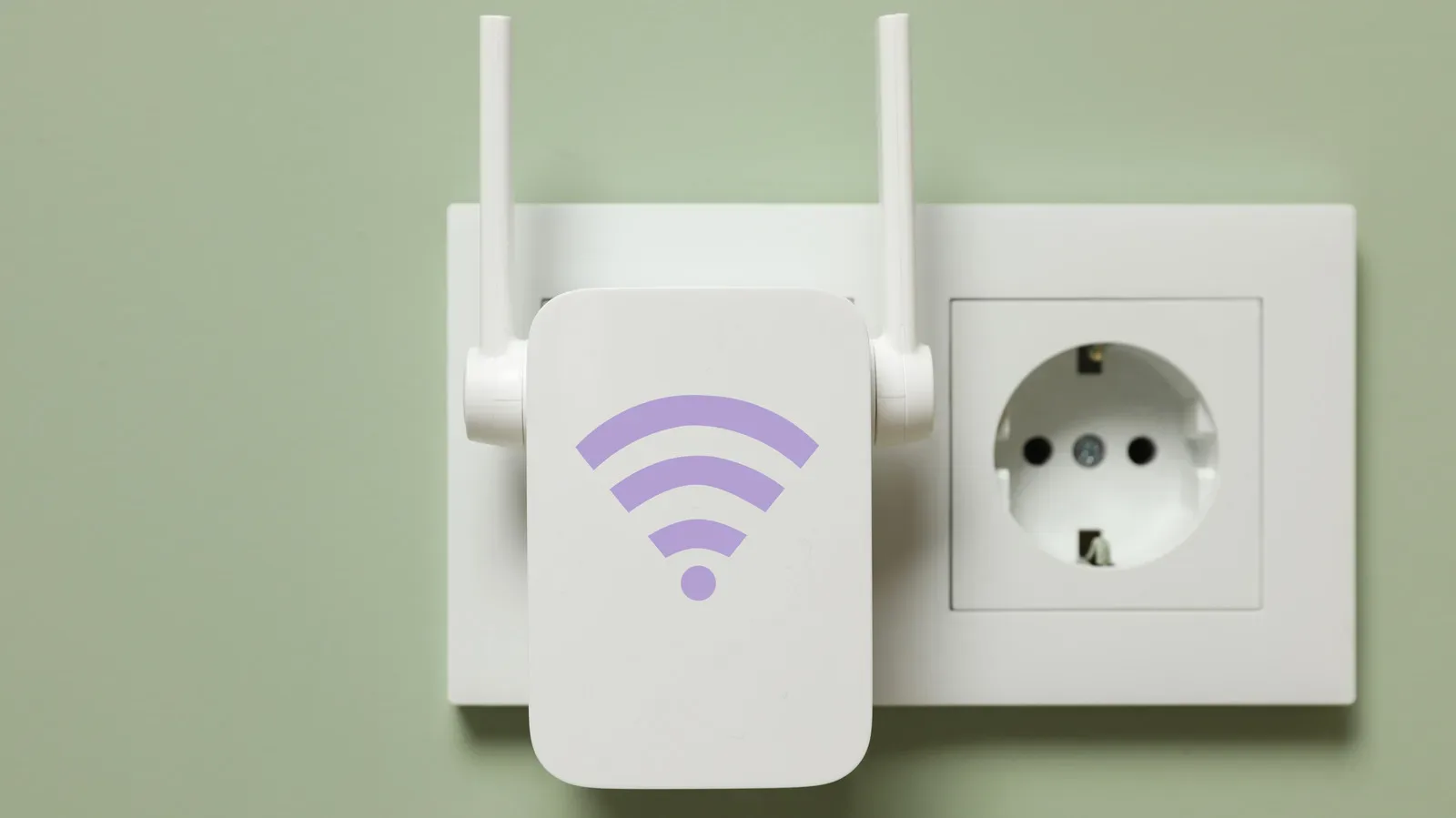 A Wi-Fi extender placed between a home router and a gaming room