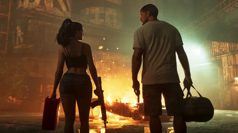 Jason and Lucia, holding cases and weapons, look at each other before a burning car in a dark warehouse.